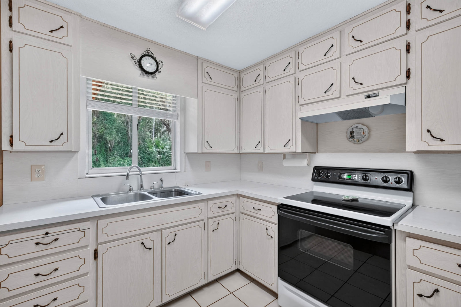 White kitchen with breakfast bar